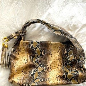 Large faux snake skin shoulder bag. Great for everyday and travel!